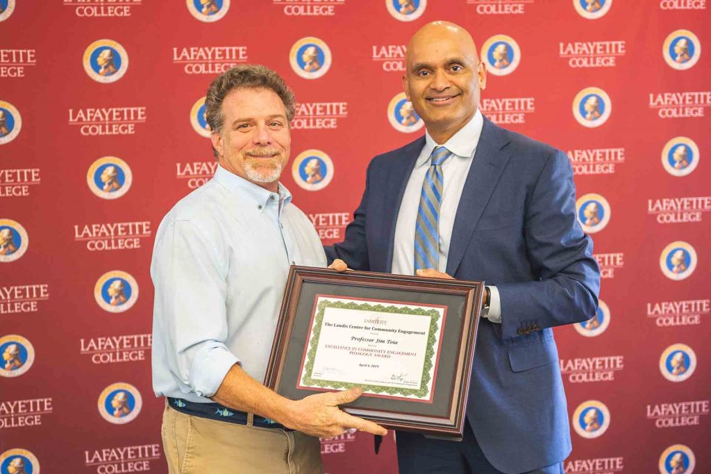 Jim Toia, director of community-based teaching, with provost Abu Rizvi