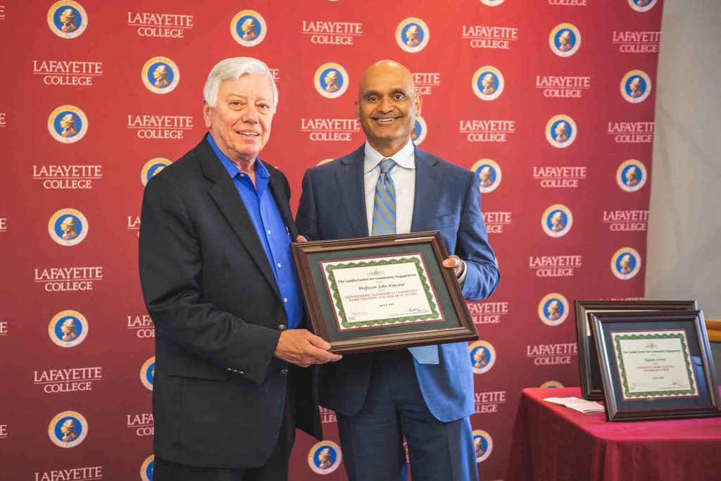 Prof. John Kincaid with provost Abu Rizvi