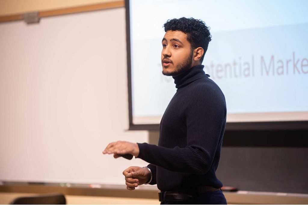 Student presents his restaurant supply business.