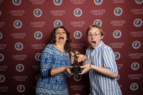 Two member of Interfaith Council hold their award.