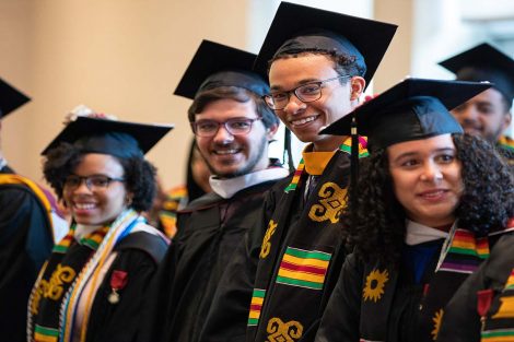 Posse scholars stand during the ceremony.