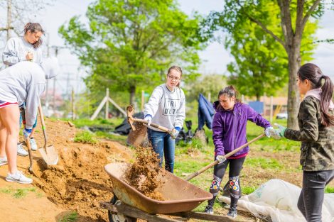 Students gardening at Easton Urban Farm for Lafapalooza