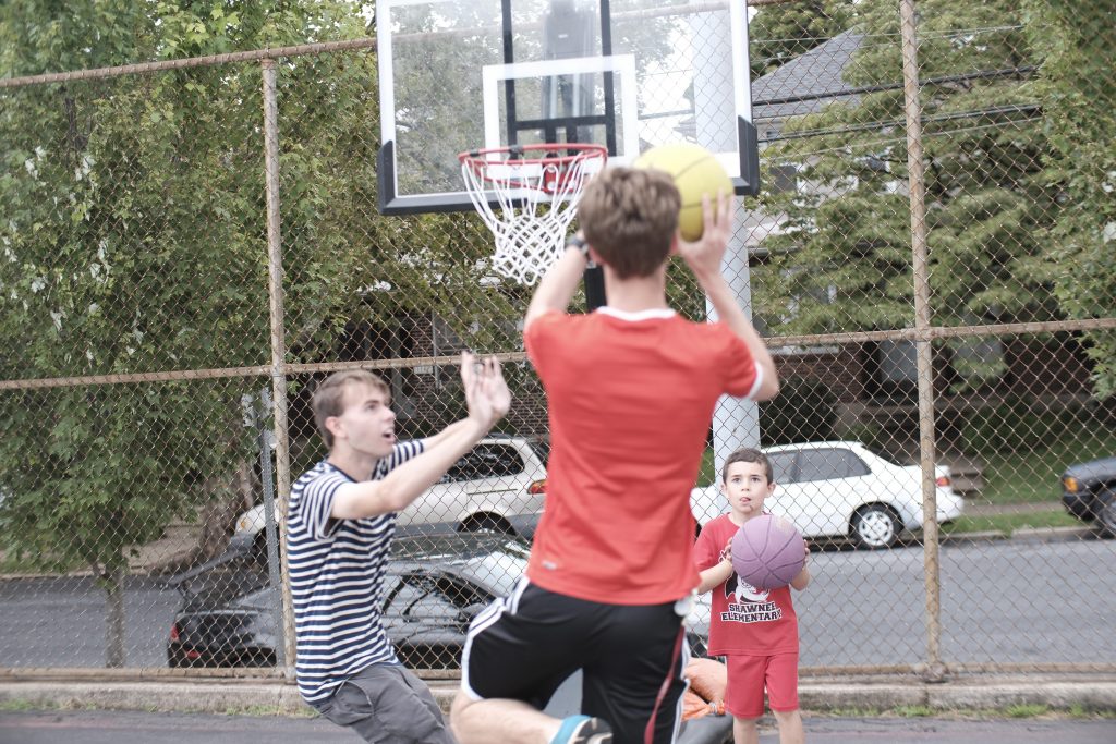 Lafayette students goes up for a jumper.