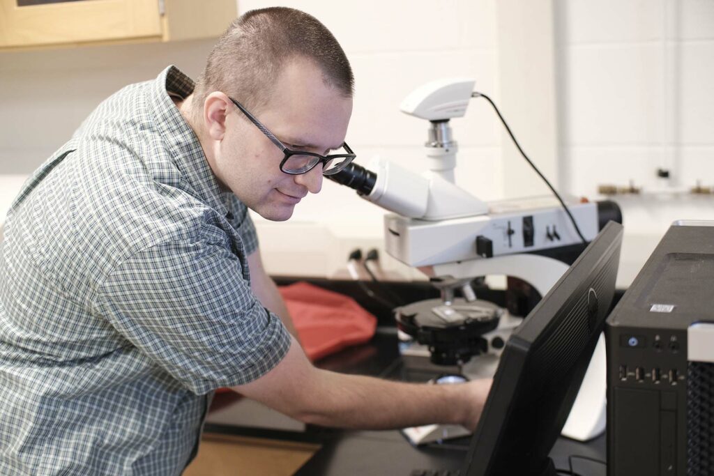 Ryan Van Horn ’04 tests a solution sample