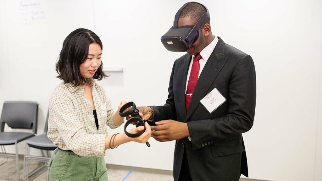 Students demonstrate virtual reality technology at Rockwell opening