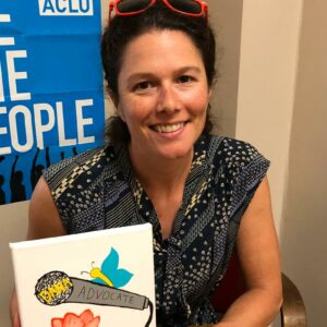 Dana Cuomo holds a drawing made for her by a student survivor of sexual assault.