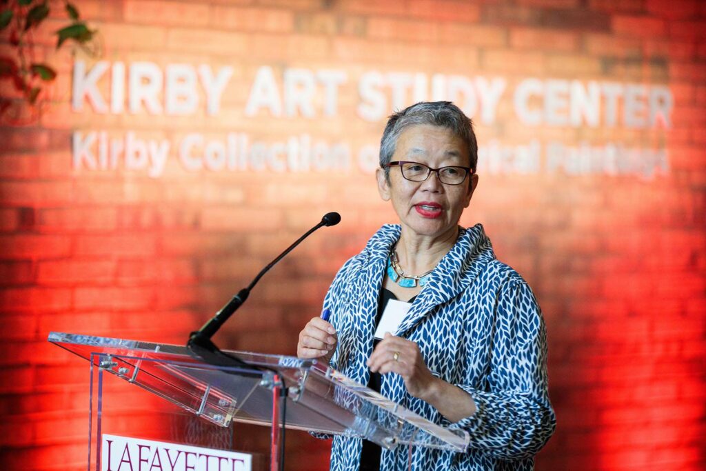Michiko Okaya speaks with those gathered for the dedication