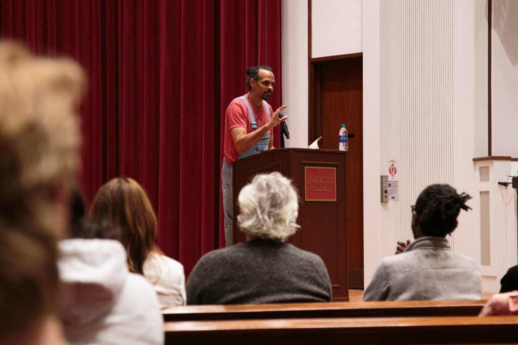 Ross Gay '96 on stage in Colton Chapel