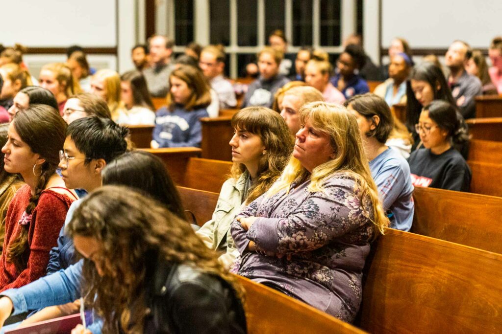 The audience at Colton Chapel listens to Schuyler Bailar.