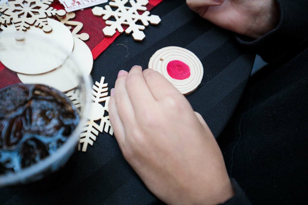 Student colors an ornament
