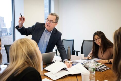 John Pierce '81 of The Rockefeller Group hosts Chelsea Catlin '21, Kayla Magee '19, and Skye Liu '20.