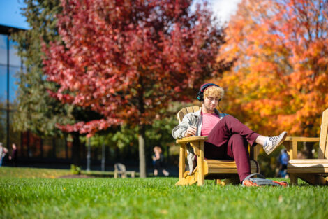students set against the beautiful oranges and yellows of fall scenery at Lafayette
