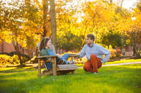 students set against the beautiful oranges and yellows of fall scenery at Lafayette