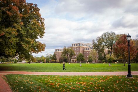 students set against the beautiful oranges and yellows of fall scenery at Lafayette