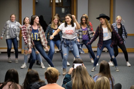 sororities dancing with each other in the marlo room