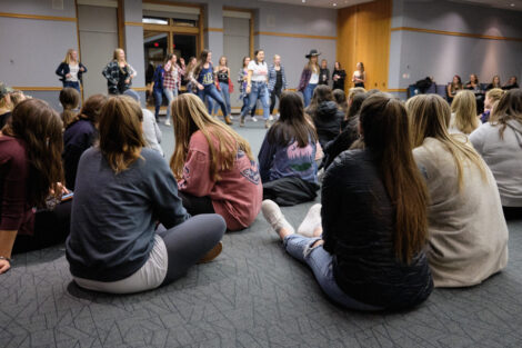 sororities dancing with each other in the marlo room