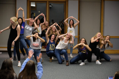 sororities dancing with each other in the marlo room