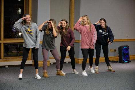 sororities dancing with each other in the marlo room