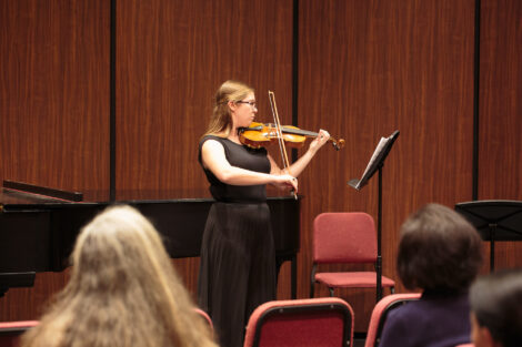 Students perform at the honors recital for students taking lessons