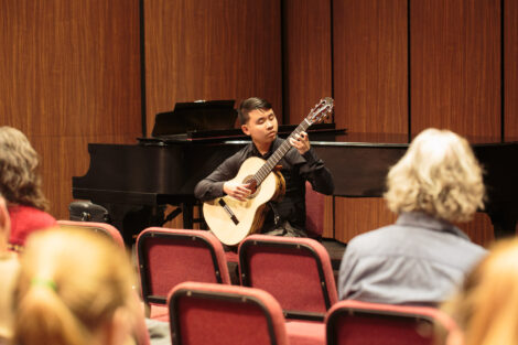 Students perform at the honors recital for students taking lessons