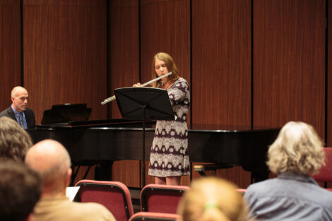 Students perform at the honors recital for students taking lessons