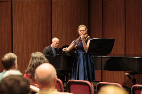 Students perform at the honors recital for students taking lessons
