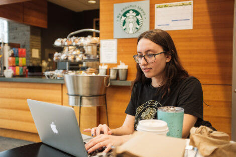Tori Yordt '20 sits in Skillman Cafe waiting for her Pardner students to check in for their final projects.