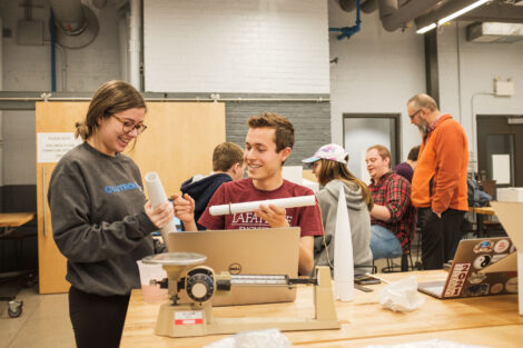 students build rockets in the maker space of acopian