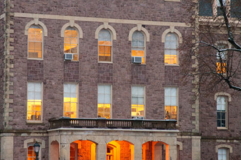 Snow dusts the campus at dusk