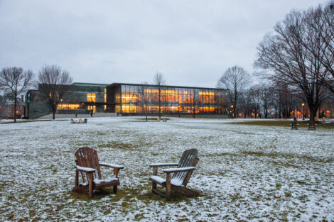 Snow dusts the campus at dusk