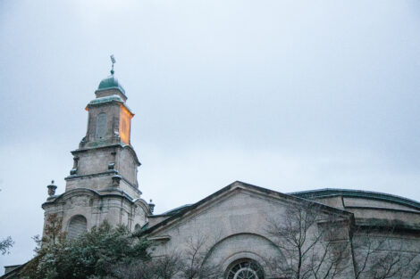 Snow dusts the campus at dusk