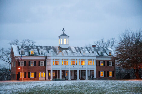 Snow dusts the campus at dusk