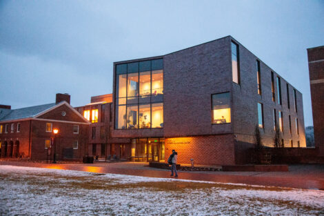 Snow dusts the campus at dusk