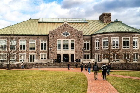 Students walk to and from Farinon College Center on the first day of spring semester.