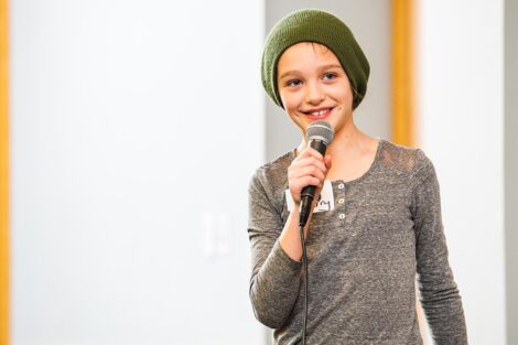 A middle school student talks.