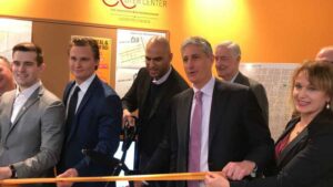 Yusuf Dahl and JB Reilly at a ribbon cutting ceremony for Allentown Real Estate lap