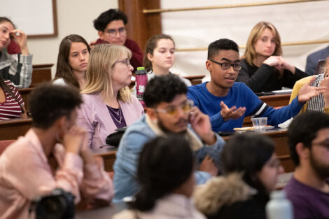 A student asks Stuart Delery a question during his talk on campus
