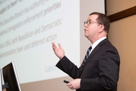Stuart Delery P’23 speaks to an audience on campus about DACA