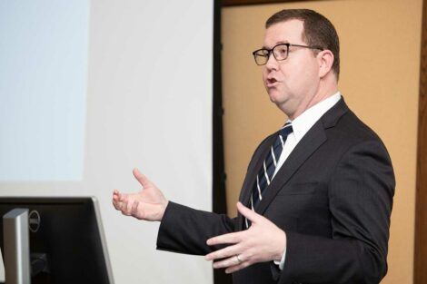 Stuart Delery P’23 speaks to an audience on campus about DACA