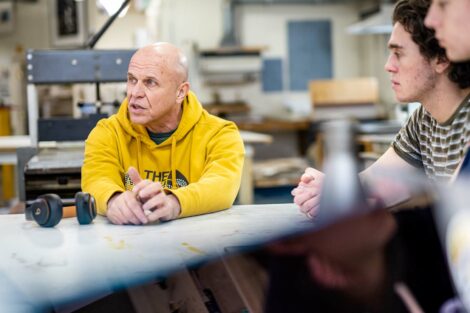 Artist Glenn Goldberg speaks with the students