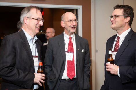 Alum talk and smile at Networking Night