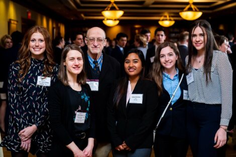 Alumni pose for photo