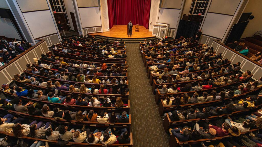 Yusef Salaam speaks to an audience in Colton Chapel