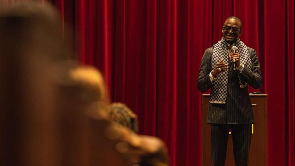 Yusef Salaam speaks to an audience in Colton Chapel