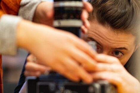 Students put lens on camera