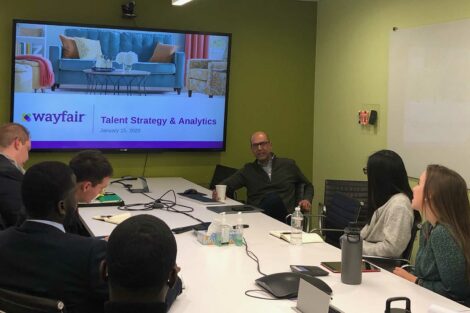 Alum speaks with students