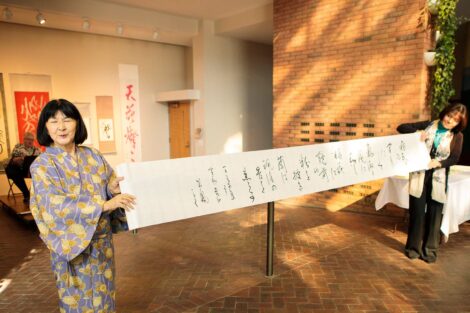 calligraphy master Shuho Kondo uses brush on paper