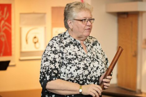 Nora Nohraku Suggs holds the shakuhachi