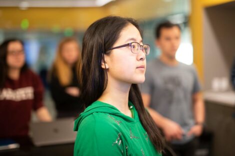 Students listen as escorted through the Dyer Center Maker Space