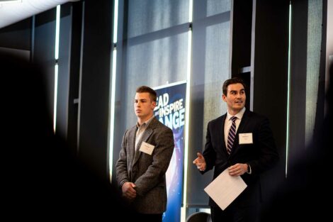 Two students present their ideas to judges